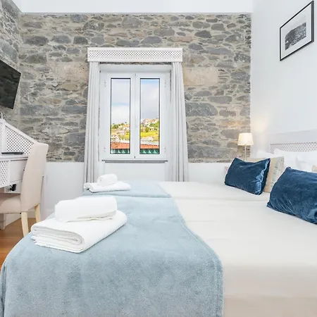 Casa Pereira * Relogio do Poiso