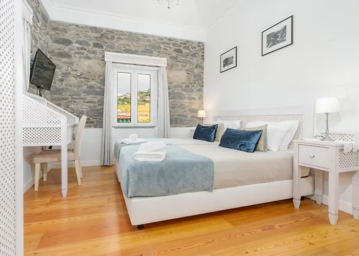 Casa Pereira * Relogio do Poiso